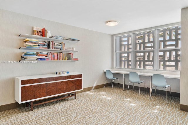office with baseboards and plenty of natural light