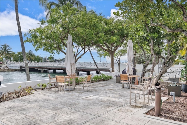 3 Island Ave Unit 07B, Miami Beach, FL 33139 - view of patio / terrace with a water view and outdoor dining area