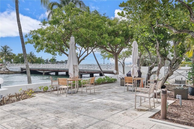 3 Island Ave Unit 07B, Miami Beach, FL 33139 - view of patio / terrace with a water view and outdoor dining area