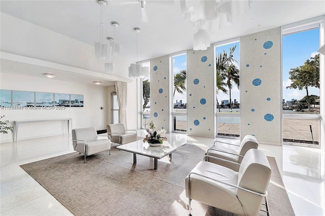 living area with speckled floor