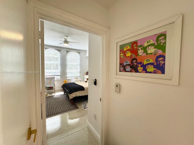 3001 NE 185th St Unit 225, Aventura, FL 33180 - hall featuring baseboards and light tile patterned floors