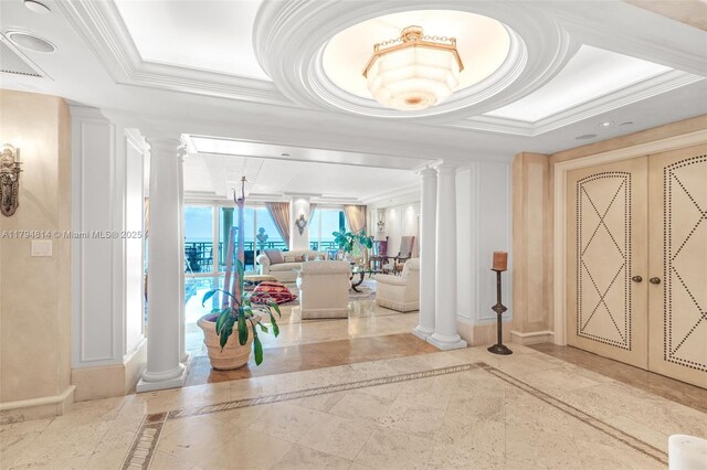 445 Grand Bay Dr Unit 1001, Key Biscayne, FL 33149 - building lobby featuring crown molding