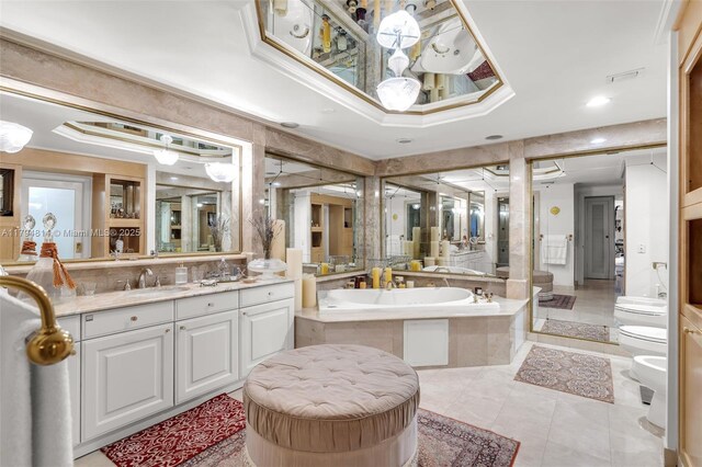 445 Grand Bay Dr Unit 1001, Key Biscayne, FL 33149 - full bath with toilet, a bidet, a bath, vanity, and tile patterned flooring