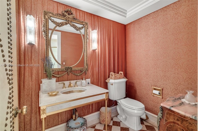 445 Grand Bay Dr Unit 1001, Key Biscayne, FL 33149 - bathroom featuring toilet, vanity, crown molding, baseboards, and wallpapered walls
