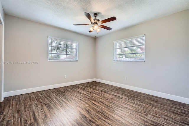4380 NW 4th Ct, Coconut Creek, FL 33066 - empty room featuring baseboards, plenty of natural light, and wood finished floors