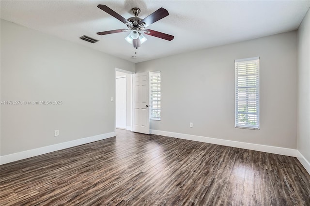 4380 NW 4th Ct, Coconut Creek, FL 33066 - unfurnished room featuring visible vents, a wealth of natural light, and dark wood-style floors