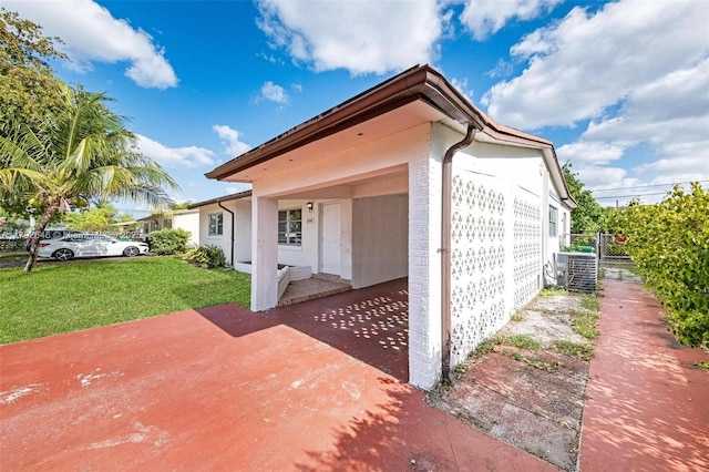6808 SW 22nd Ct, Miramar, FL 33023 - view of property exterior with central AC unit