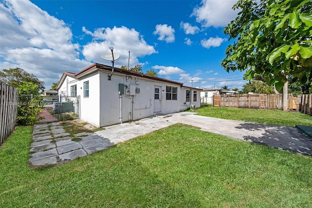 6808 SW 22nd Ct, Miramar, FL 33023 - back of house featuring a patio area and stucco siding