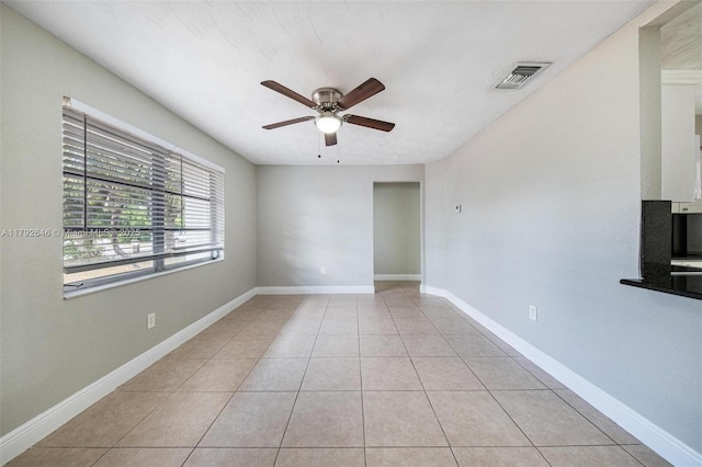 6808 SW 22nd Ct, Miramar, FL 33023 - unfurnished room featuring ceiling fan, light tile patterned flooring, and baseboards