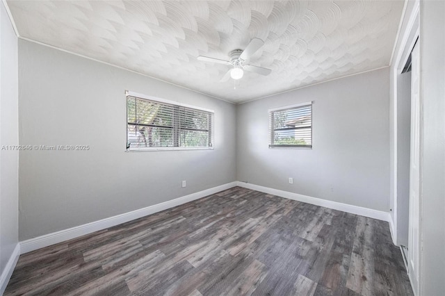 6808 SW 22nd Ct, Miramar, FL 33023 - unfurnished room with a ceiling fan, dark wood-style flooring, crown molding, and baseboards
