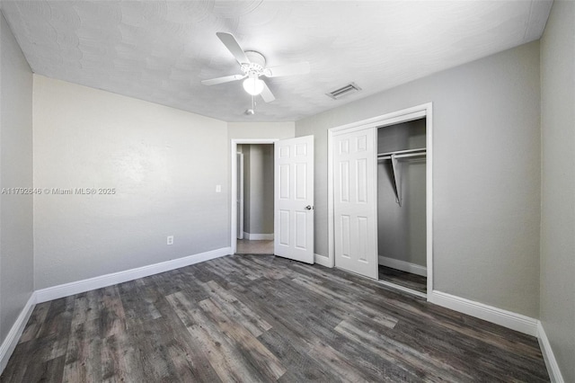 6808 SW 22nd Ct, Miramar, FL 33023 - unfurnished bedroom featuring dark wood-style floors, baseboards, a closet, and a ceiling fan