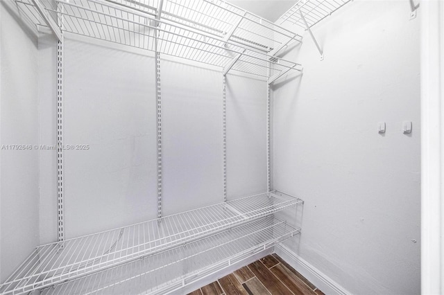 6808 SW 22nd Ct, Miramar, FL 33023 - walk in closet featuring dark wood finished floors
