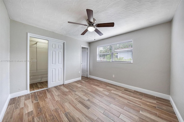 6808 SW 22nd Ct, Miramar, FL 33023 - unfurnished bedroom with light wood-type flooring, baseboards, a ceiling fan, and a closet