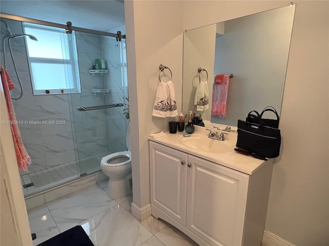 bathroom featuring vanity, marble finish floor, toilet, baseboards, and a marble finish shower