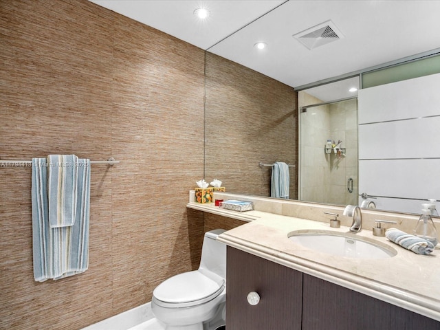 full bath featuring visible vents, vanity, toilet, recessed lighting, and a stall shower