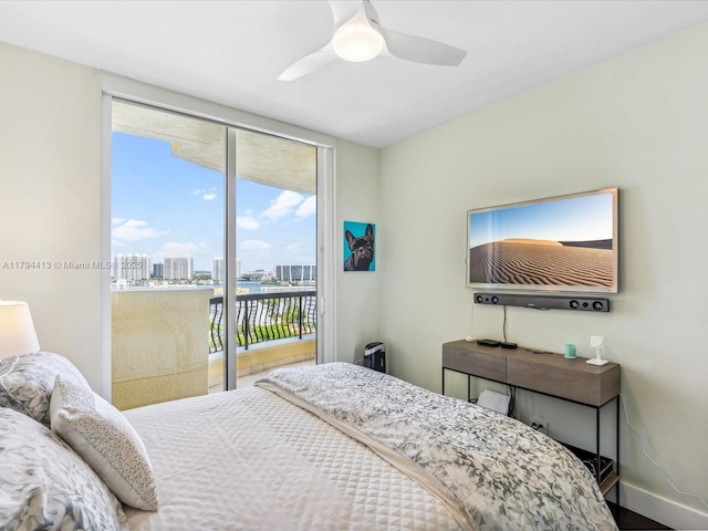 bedroom featuring access to outside, baseboards, and ceiling fan