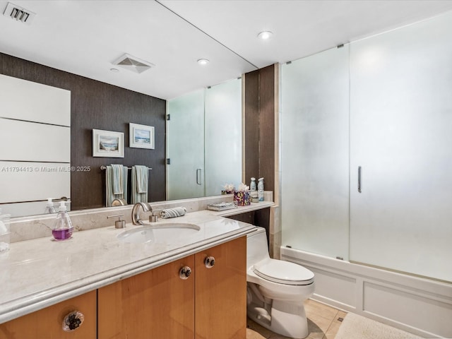 full bath featuring toilet, tile patterned floors, visible vents, and vanity