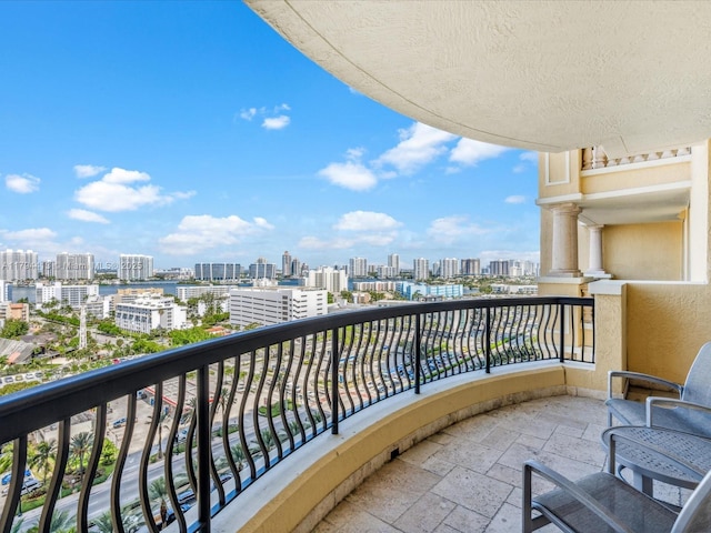 balcony featuring a view of city