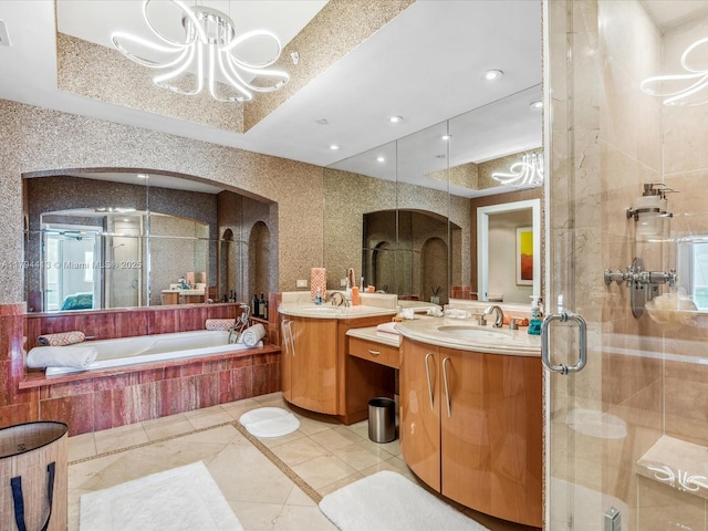 17875 Collins Ave Unit 1605, Sunny Isles Beach, FL 33160 - bathroom featuring a stall shower, two vanities, tile patterned floors, a bath, and a chandelier
