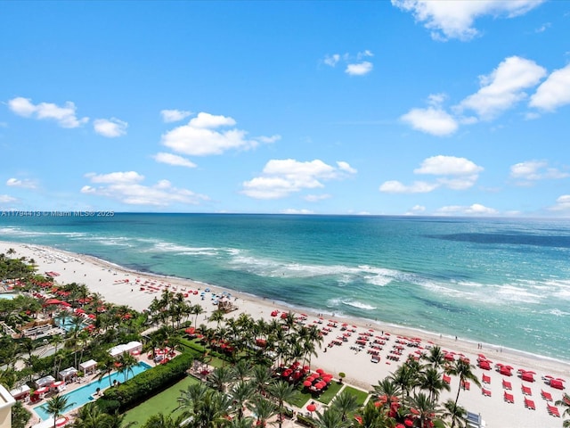 bird's eye view with a beach view and a water view