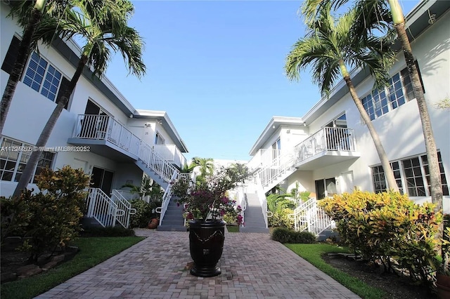 view of property's community featuring stairway