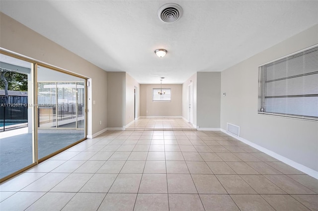 6620 NW 21st Ct, Sunrise, FL 33313 - spare room with light tile patterned floors, baseboards, and visible vents