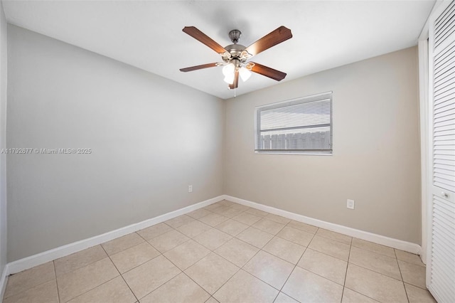 6620 NW 21st Ct, Sunrise, FL 33313 - spare room featuring baseboards, a ceiling fan, and light tile patterned flooring