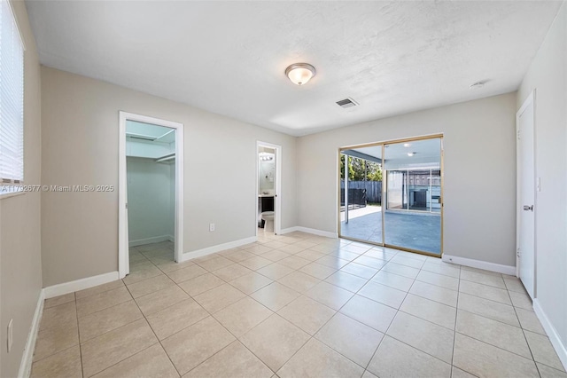 6620 NW 21st Ct, Sunrise, FL 33313 - spare room with visible vents, baseboards, and light tile patterned floors