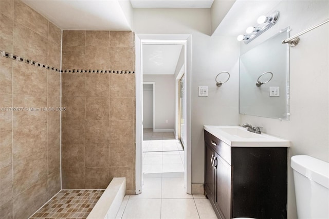 6620 NW 21st Ct, Sunrise, FL 33313 - bathroom featuring vanity, tile patterned floors, a tile shower, and toilet