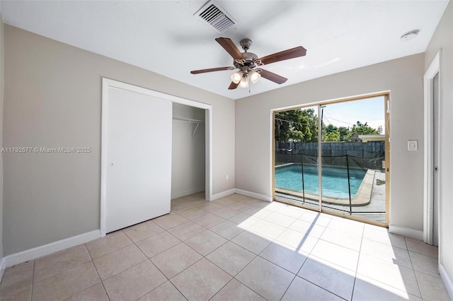 6620 NW 21st Ct, Sunrise, FL 33313 - unfurnished bedroom featuring visible vents, a closet, access to exterior, baseboards, and a ceiling fan