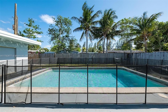 6620 NW 21st Ct, Sunrise, FL 33313 - view of pool with a fenced in pool and a fenced backyard