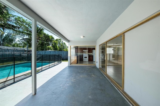 6620 NW 21st Ct, Sunrise, FL 33313 - view of patio / terrace featuring a fenced in pool and a fenced backyard