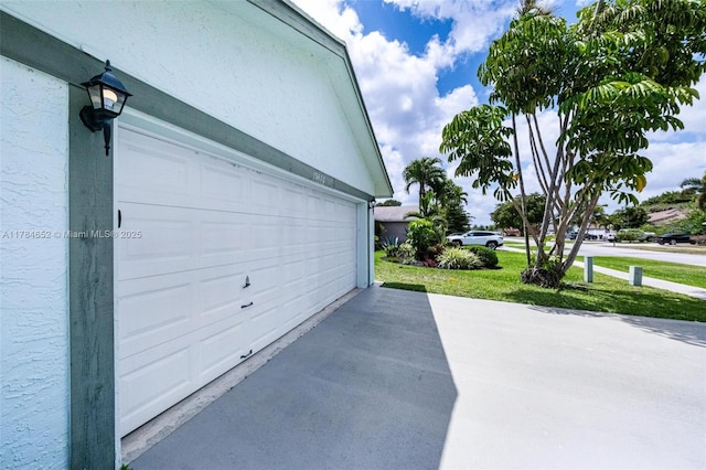 garage with driveway