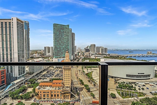 balcony with a city view and a water view
