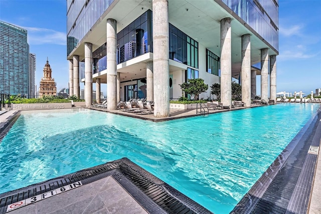 community pool with a patio