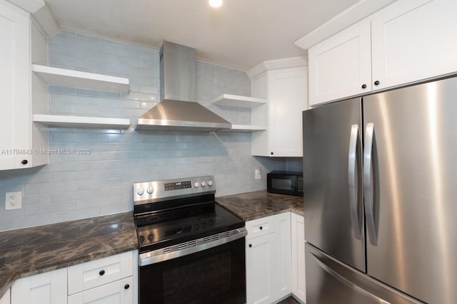 kitchen with open shelves, appliances with stainless steel finishes, backsplash, and wall chimney range hood