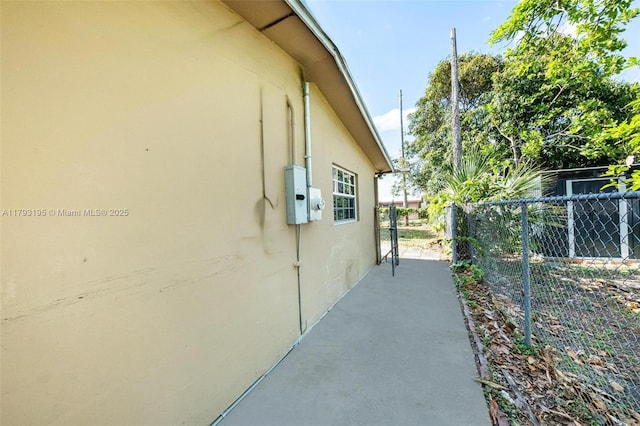 6421 NW 24th Pl, Sunrise, FL 33313 - view of home's exterior with fence and stucco siding