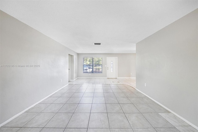 6421 NW 24th Pl, Sunrise, FL 33313 - unfurnished room featuring baseboards, visible vents, and light tile patterned floors