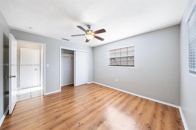 6421 NW 24th Pl, Sunrise, FL 33313 - unfurnished bedroom featuring light wood-style floors, baseboards, a closet, and visible vents