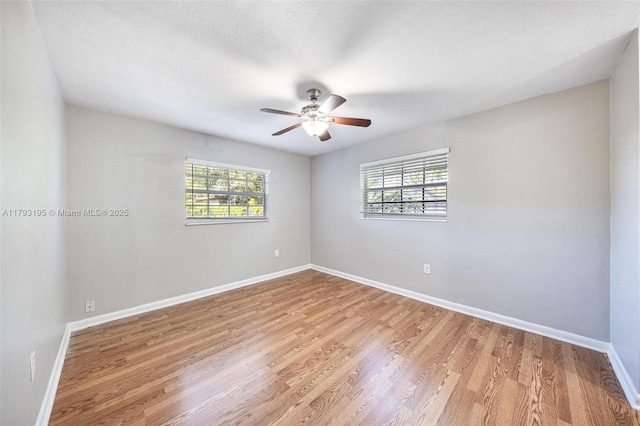 6421 NW 24th Pl, Sunrise, FL 33313 - spare room featuring baseboards, light wood-style flooring, and ceiling fan