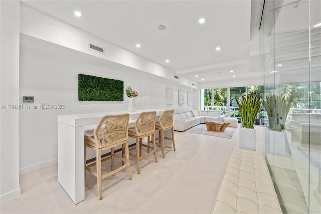 455 NE 39th St Unit 304, Miami, FL 33137 - bar featuring recessed lighting, light tile patterned flooring, and baseboards
