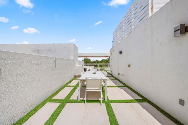 view of patio featuring outdoor dining space