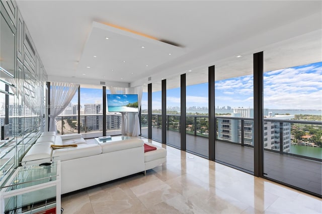 5875 Collins Ave Unit 1908, Miami Beach, FL 33140 - living area with floor to ceiling windows and recessed lighting