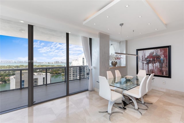 5875 Collins Ave Unit 1908, Miami Beach, FL 33140 - dining space featuring expansive windows, recessed lighting, a water view, and a city view
