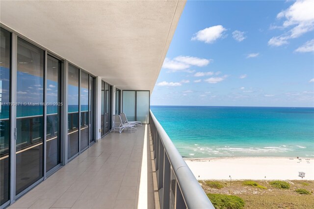 5875 Collins Ave Unit 1908, Miami Beach, FL 33140 - balcony featuring a water view and a view of the beach
