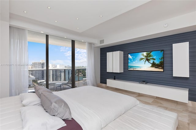 5875 Collins Ave Unit 1908, Miami Beach, FL 33140 - bedroom with access to outside, recessed lighting, expansive windows, and visible vents