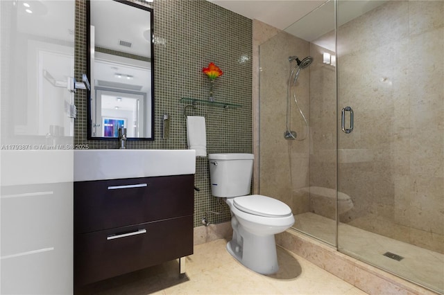 5875 Collins Ave Unit 1908, Miami Beach, FL 33140 - bathroom with visible vents, vanity, tile walls, and a shower stall