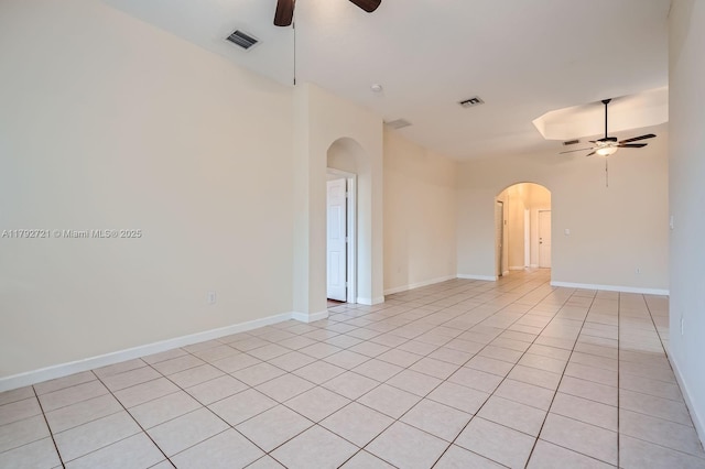 8857 SW 222nd Ter, Cutler Bay, FL 33190 - unfurnished room with arched walkways, a ceiling fan, light tile patterned flooring, and visible vents