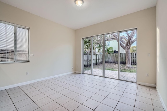 8857 SW 222nd Ter, Cutler Bay, FL 33190 - empty room featuring light tile patterned flooring and baseboards