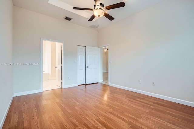 8857 SW 222nd Ter, Cutler Bay, FL 33190 - unfurnished bedroom with baseboards, light wood finished floors, and visible vents